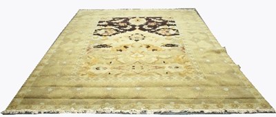 Lot 816 - An Agra style carpet, the central field with...