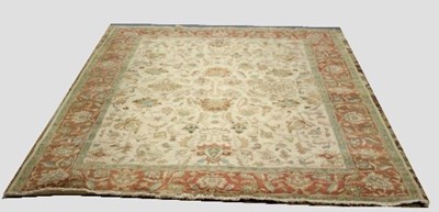 Lot 821 - A modern Indian carpet, the stylised foliate...