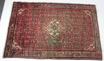 Lot 828 - A Hamadan rug with central medallion and...