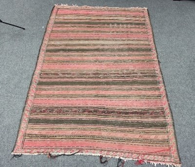 Lot 833 - A Kurdish kelim rug of striped design in brown,...