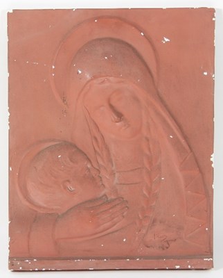 Lot 857 - A cast plaster wall plaque depicting Madonna...