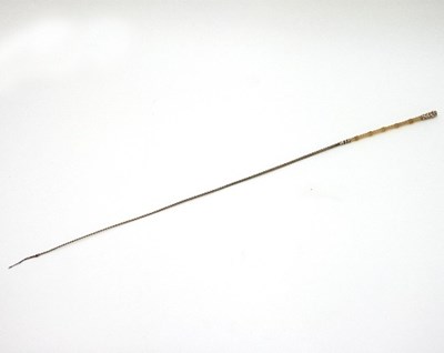 Lot 868 - A yellow metal mounted malaca riding crop, the...