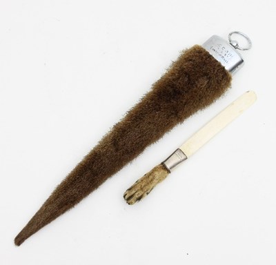 Lot 876 - A fox paw paper knife with ivory blade, the...