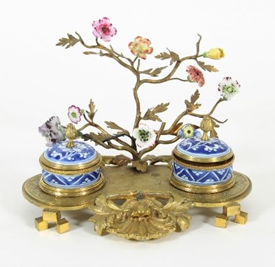 Lot 885 - A 19th Century gilt metal and porcelain...