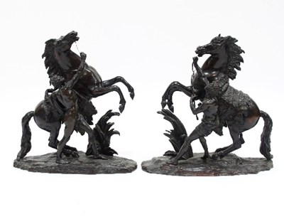 Lot 895 - A pair of bronze Marly horses/signed...