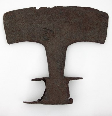 Lot 910 - An early European axe head with flattened...