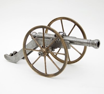 Lot 912 - A French brass and steel cannon, the barrel...