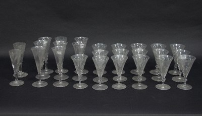 Lot 957 - A set of sixteen cut glass wine glasses with...