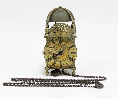 Lot 992 - A brass lantern clock, the chapter ring with...