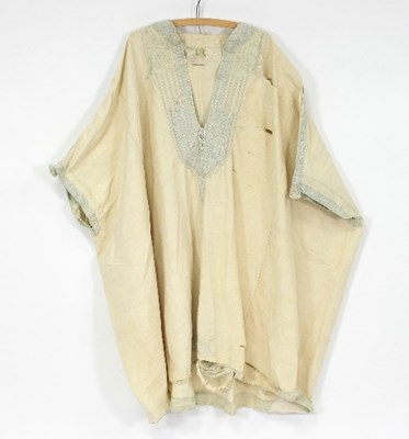 Lot 1002 - An Indian white silk tunic with embroidered...