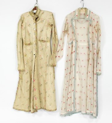 Lot 1004 - An Indian cotton robe, worked with floral...