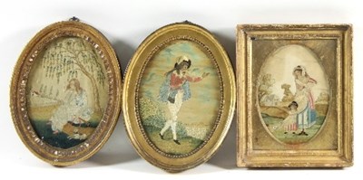 Lot 1021 - Three Georgian oval silkwork pictures, one...