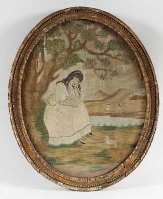 Lot 1028 - A Georgian oval silkwork picture of a young...