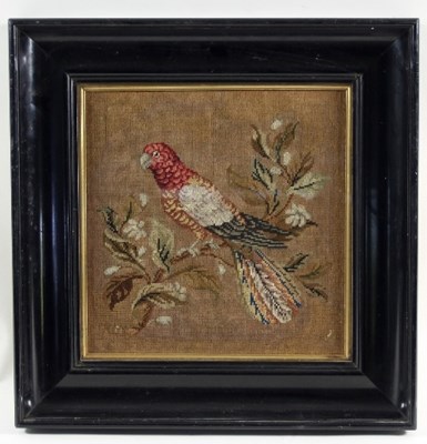 Lot 1034 - A Victorian woolwork picture of a parrot...