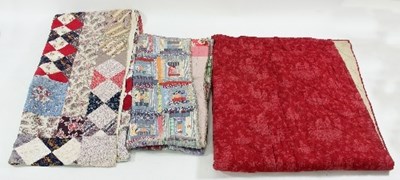 Lot 1039 - Two old log cabin design patchwork quilts,...