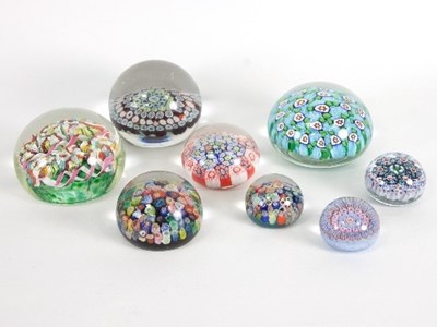 Lot 12 - A group of eight glass paperweights, various...