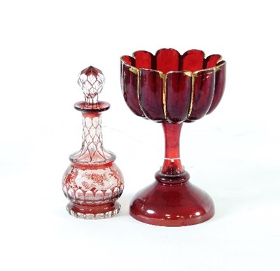 Lot 33 - A Bohemian red glass goblet, the bowl of lobed...