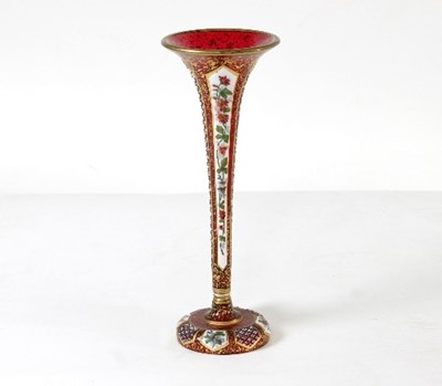 Lot 34 - A Bohemian red glass trumpet shaped vase...