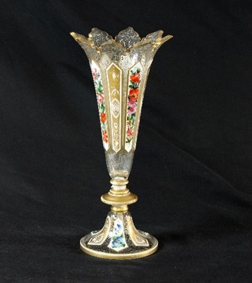 Lot 35 - A Bohemian glass vase with ogee shaped rim and...