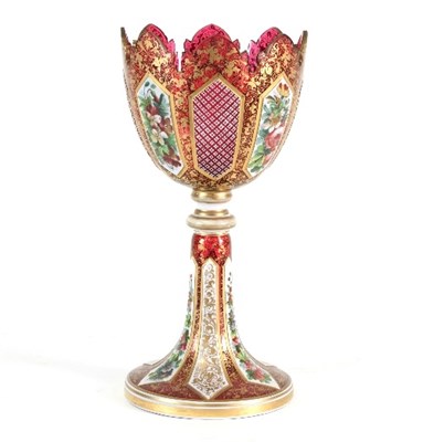 Lot 36 - A Bohemian red glass vase, decorated white...