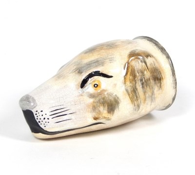 Lot 74 - A 19th Century English earthenware hound head...