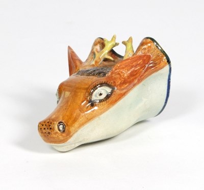 Lot 76 - A Staffordshire pearlware stag head stirrup...