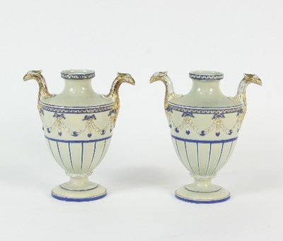 Lot 81 - A pair of English neoclassical pearlware urns,...