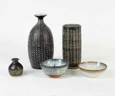 Lot 94 - A stoneware vase with incised stylised chevron...