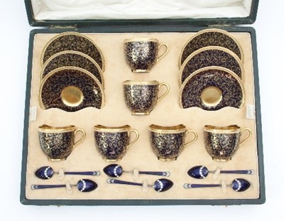 Lot 101 - A set of six Royal Worcester coffee cups and...