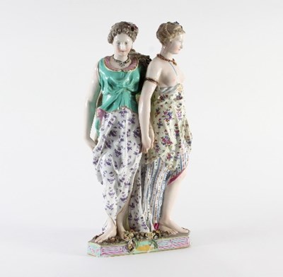 Lot 105 - A porcelain figure of the Three Graces after...