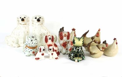 Lot 106 - A pair of Staffordshire dogs highlighted in...