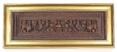 Lot 124 - An Indian carved hardwood panel depicting...