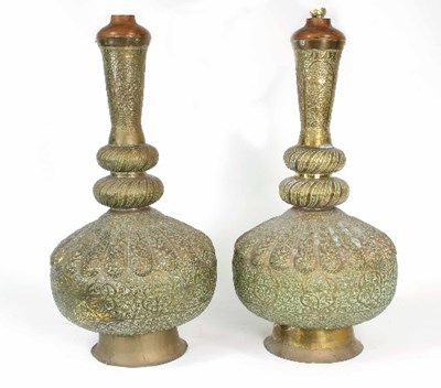 Lot 126 - A pair of Middle Eastern brass vases lobed...