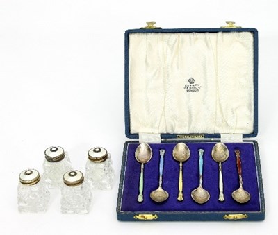 Lot 144 - A set of six silver and enamel coffee spoons,...