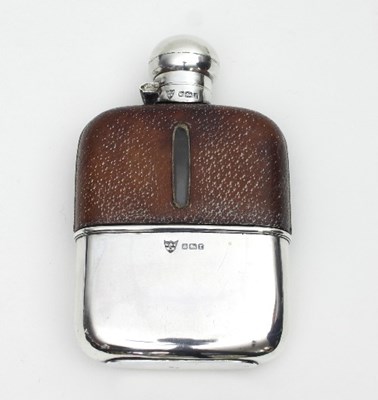 Lot 165 - A silver mounted hip flask, Sheffield 1909,...