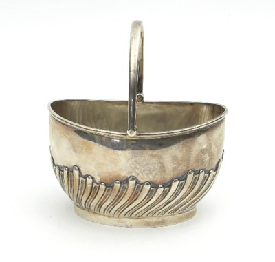 Lot 170 - A Victorian swing handled silver sugar basin,...