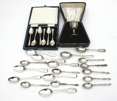 Lot 174 - A silver egg cup, cased, a set of six coffee...