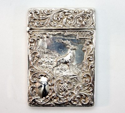 Lot 182 - An Edwardian embossed silver card case,...