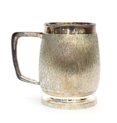 Lot 192 - A textured silver mug, Asprey & Co Ltd, London...