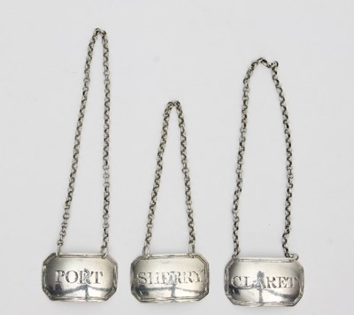 Lot 204 - Three George III silver wine labels, Joseph...