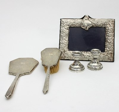 Lot 206 - An Art Deco silver-backed hand mirror and...