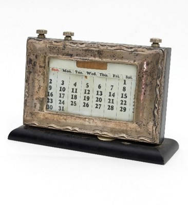 Lot 207 - A silver mounted desk calendar, Birmingham...