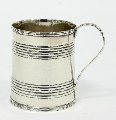 Lot 229 - A George III silver mug, London 1786, of small...