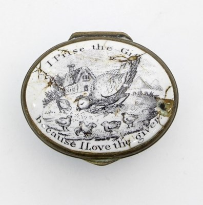 Lot 258 - A Bilston enamel patch box, the oval cover...