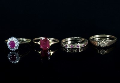 Lot 281 - A ruby and diamond cluster ring to a 9ct gold...