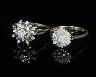 Lot 284 - A diamond cluster ring to a 9ct gold band,...