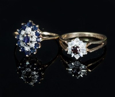 Lot 285 - A sapphire and diamond cluster ring of tiered...