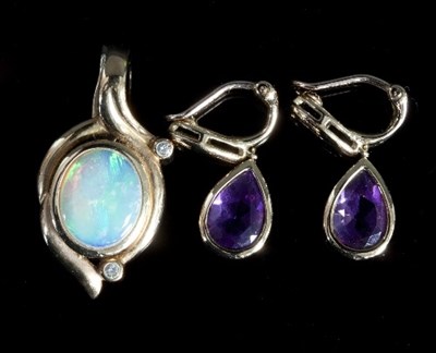 Lot 295 - A 9ct gold, opal and diamond pendant with...