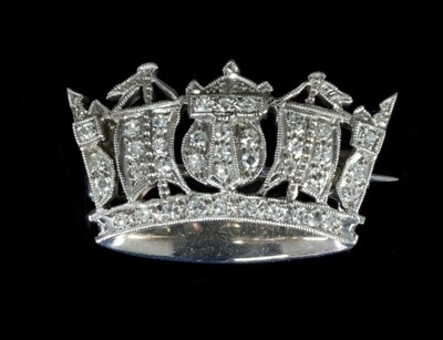 Lot 313 - A diamond and white gold naval or sweetheart...