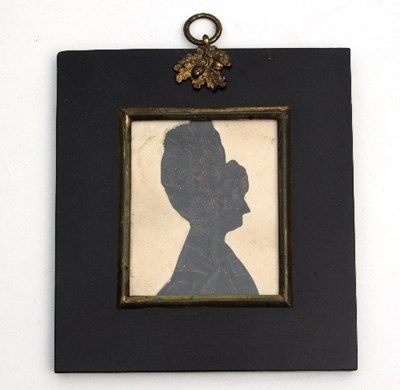 Lot 369 - A Regency silhouette bust portrait of a lady,...